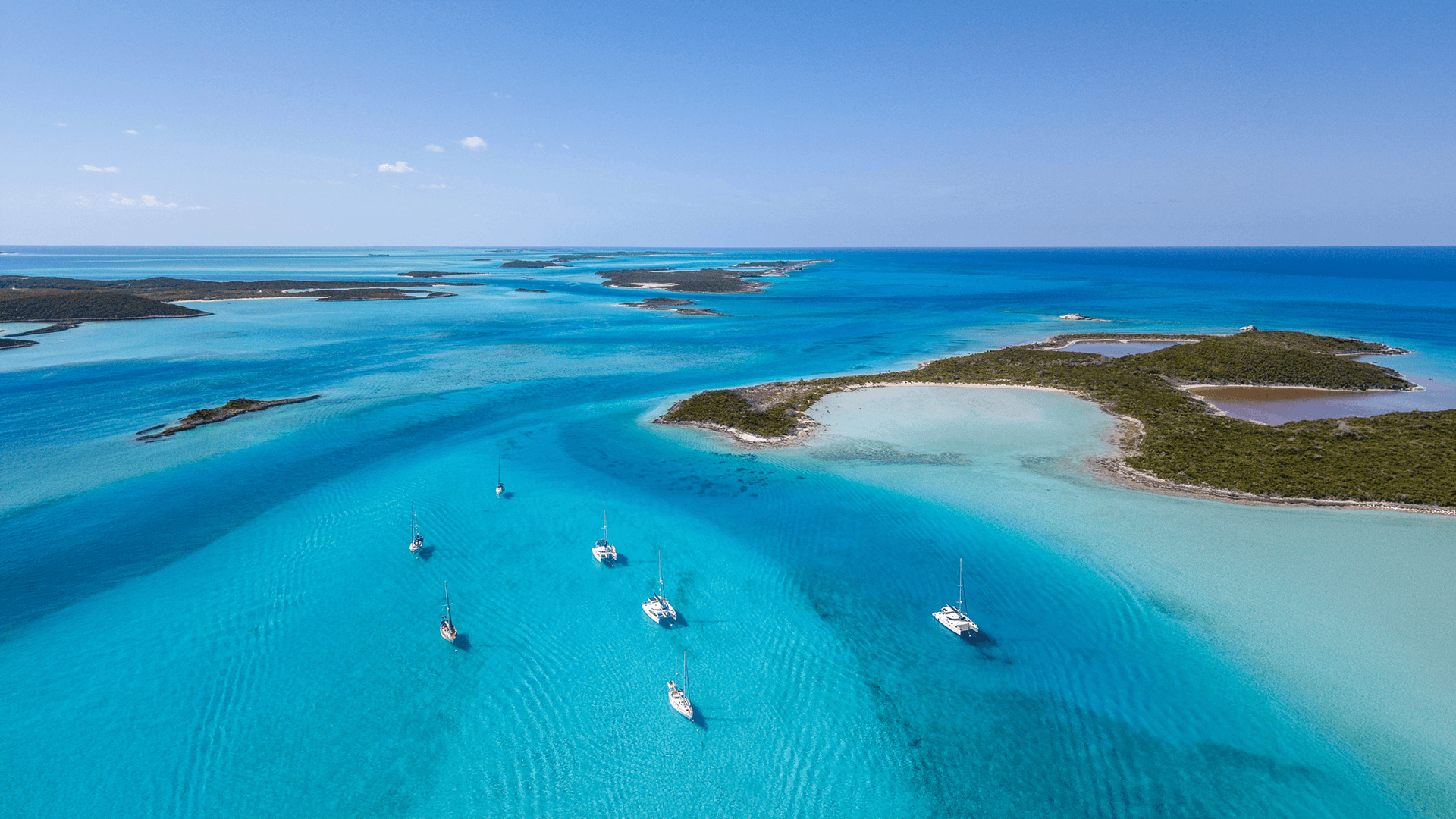 yachts sailing across the exumas
